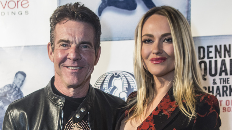 Dennis Quaid and Santa Auzina at an event