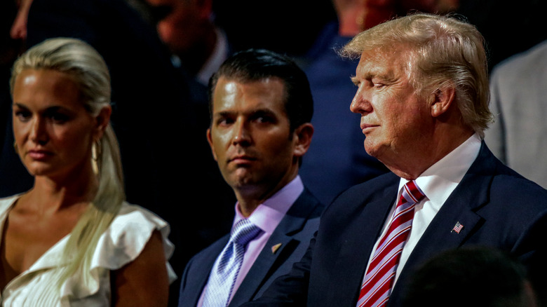 Donald Trump, Donald Trump Jr., and Vanessa Trump stand together at the DNC