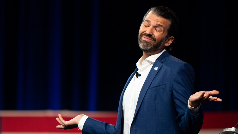 Donald Trump Jr. shrugs during a Republican campaign speech