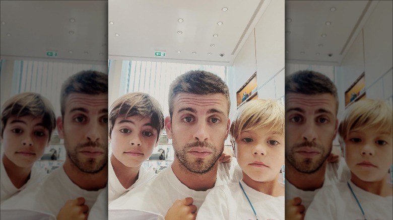 Gerard Pique poses with his sons