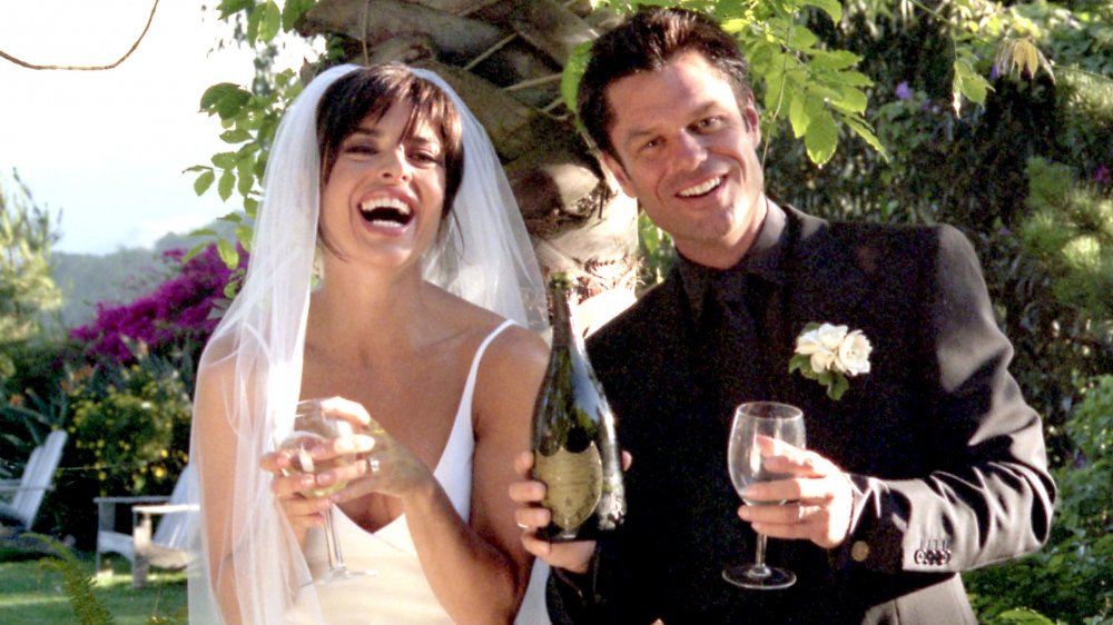 Lisa Rinna, Harry Hamlin smiling on their wedding day in 1997