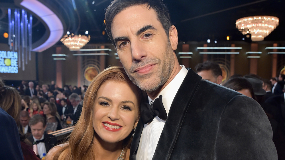 Isla Fisher and Sacha Baron Cohen smiling