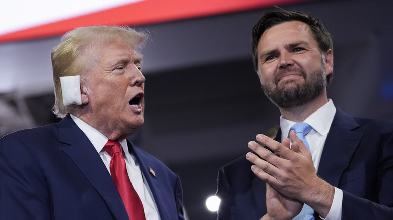 Donald Trump with open mouth, JD Vance clapping