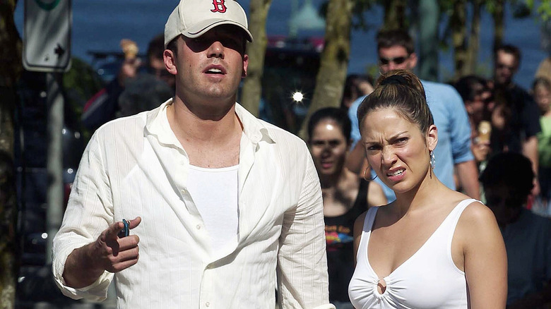 Ben Affleck with Jennifer Lopez making a stinkface 