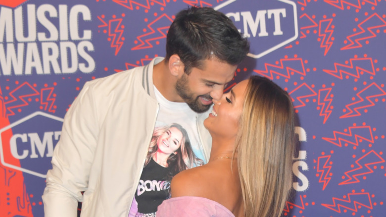 Eric Decker and Jessie James Decker touching noses