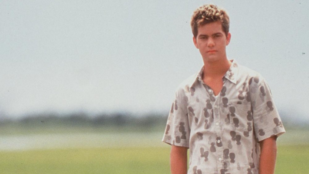 Young Joshua Jackson in a grey button up