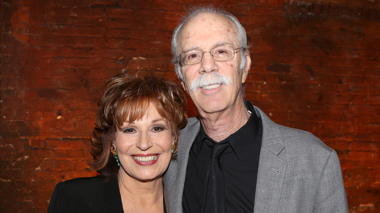 Joy Behar and Steve Janowitz pose 