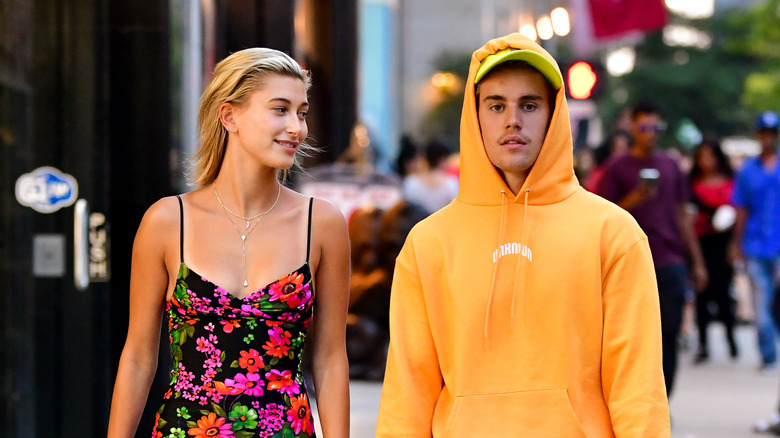 Hailey and Justin Bieber walking outside