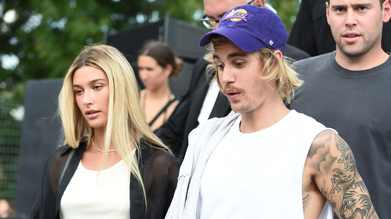 Hailey and Justin Bieber walking outside