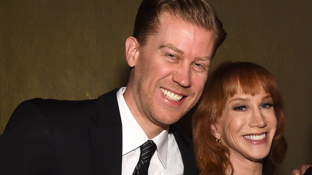 Randy Bick leaning into Kathy Griffin, both smiling big