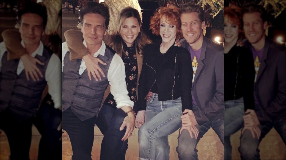 Richard Marx, Daisy Fuentes, Kathy Griffin, Randy Bick sitting at a party together