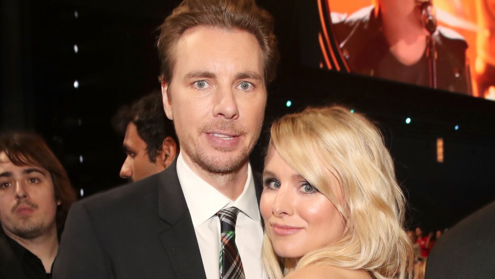 Dax Shepard and Kristen Bell smiling at award show