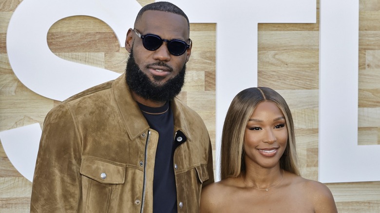 LeBron James and Savannah James pose on red carpet