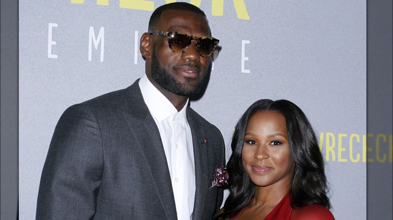 LeBron James and Savannah James smiling