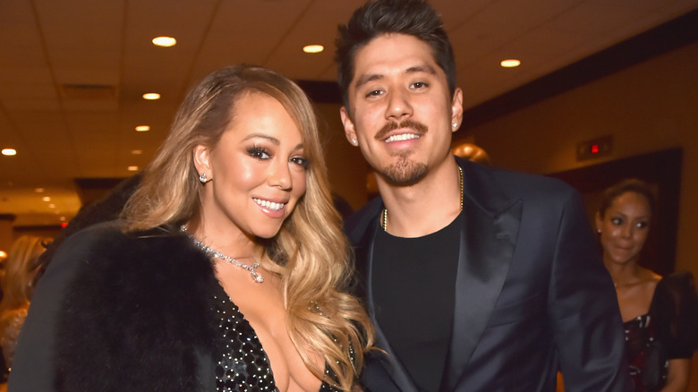 Mariah Carey and Bryan Tanaka smiling in close-up