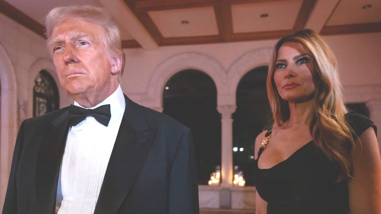 Donald Trump wearing a tuxedo and  Melania Trump in a dress