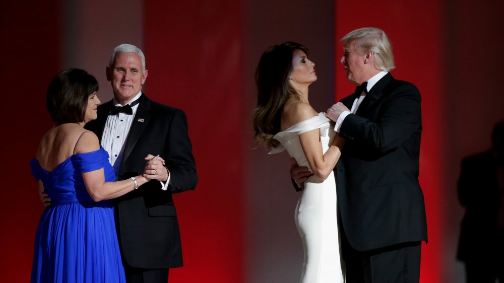 Mike Pence dancing with Karen Pence, Donald Trump dancing with Melania Trump