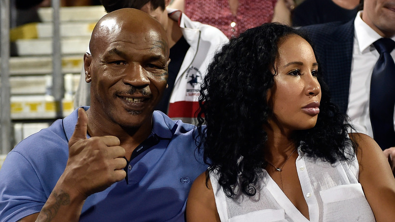 Mike Tyson smiling beside Lakiha Spicer