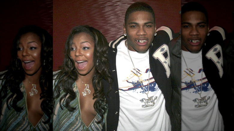 Ashanti and Nelly attending a party together