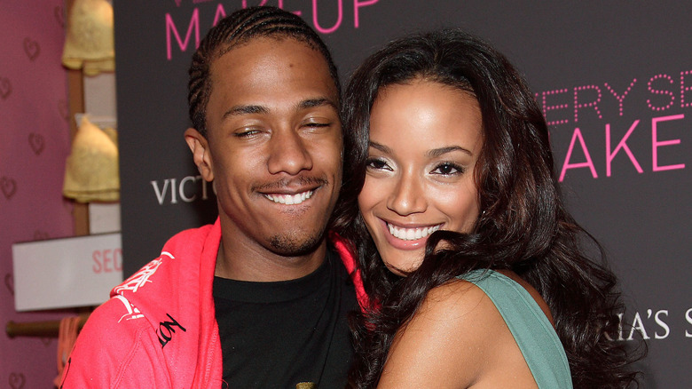 Nick Cannon posing with Selita Banks