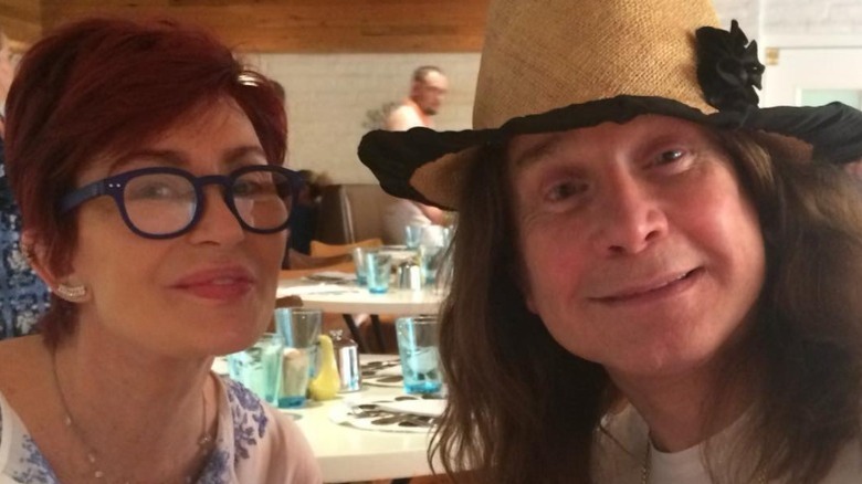 Sharon and Ozzy Osbourne smile on vacation