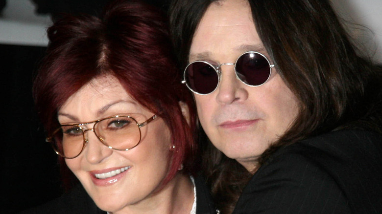 Sharon Osbourne and Ozzy Osbourne wearing glasses