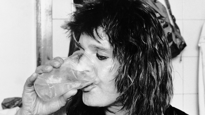 Ozzy Osbourne drinking 