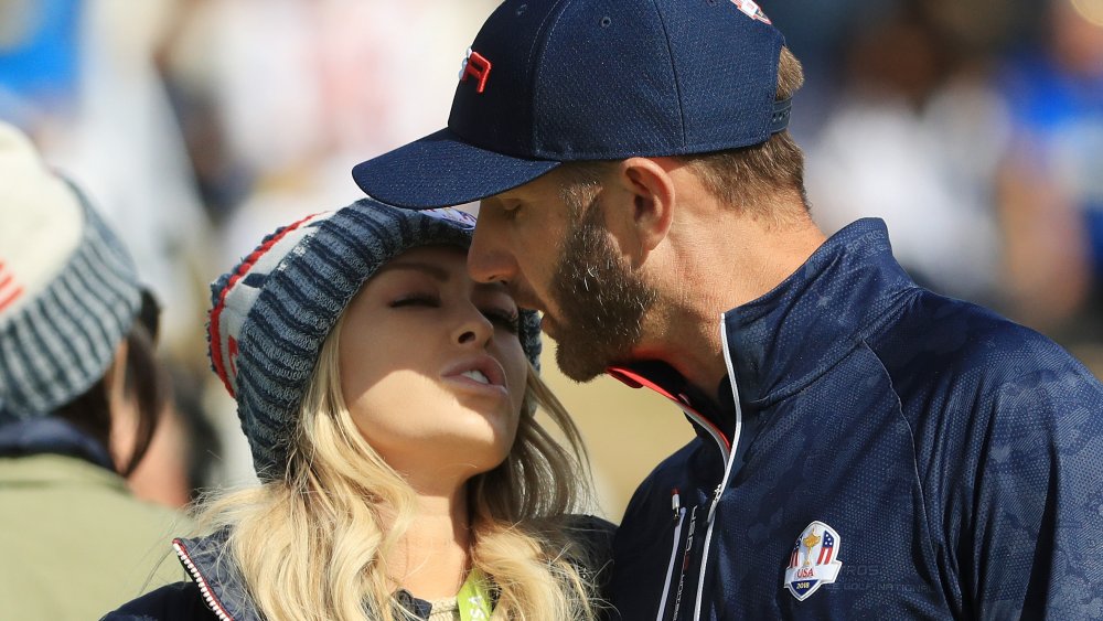 Paulina Gretzky and Dustin Johnson about to share a kiss