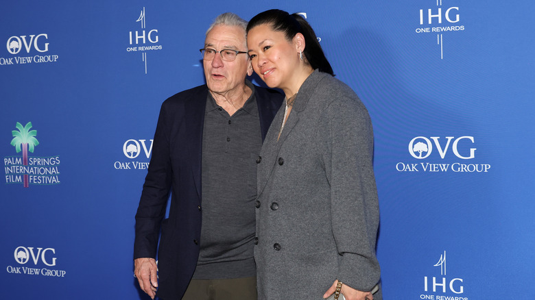 Robert De Niro and Tiffany Chen posing