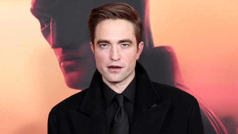 Robert Pattinson posing at The Batman premiere