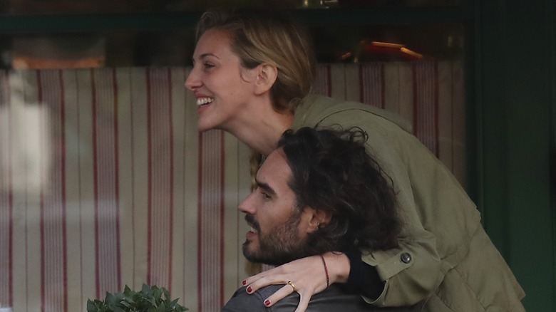 Laura Gallacher laughing with Russell Brand