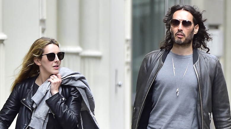 Laura Gallacher and Russell Brand walking