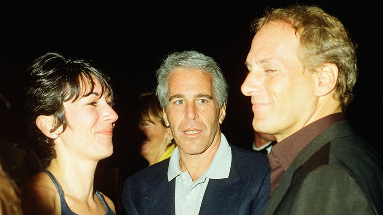 Jeffrey Epstein poses with friends at Mar-a-Lago