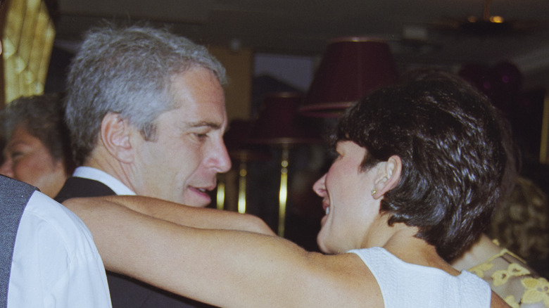 Jeffrey Epstein talking with Ghislaine Maxwell