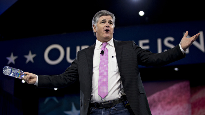 Sean Hannity arms out