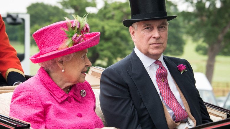 Queen Elizabeth and Prince Andrew in a carriage 