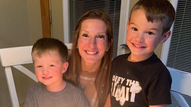 Keri Shaw smiling with her sons