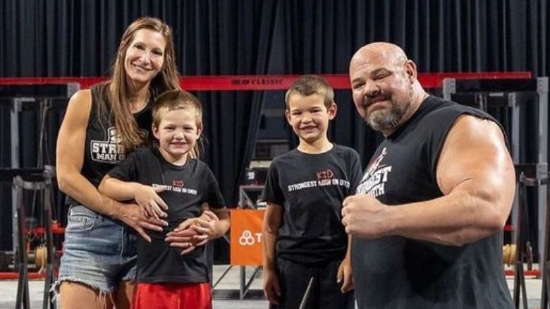 Keri and Brian smiling with their children