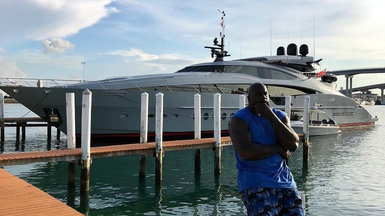 Shaquille O'Neal poses with his yacht