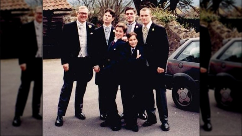 Henry Cavill as a child with his brothers and father