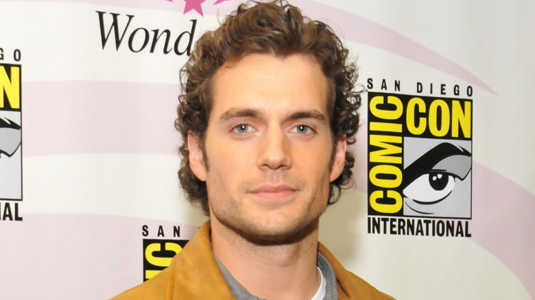 Henry Cavill wearing a leather jacket