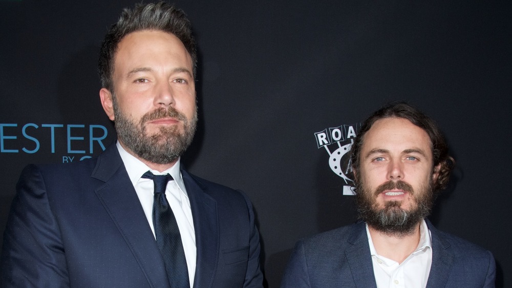 Ben Affleck and Casey Affleck posing