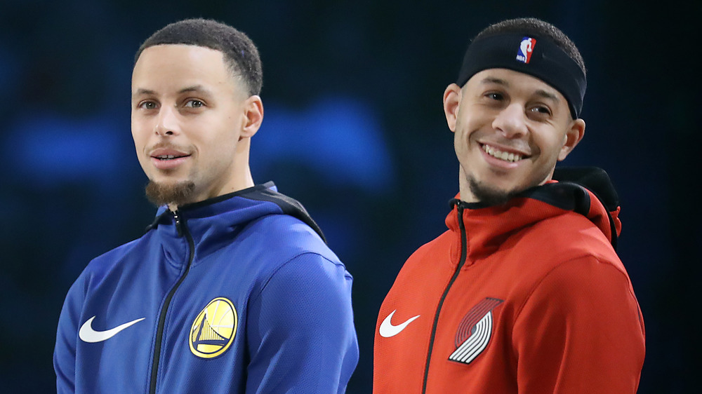 Step Curry and Seth Curry standing together