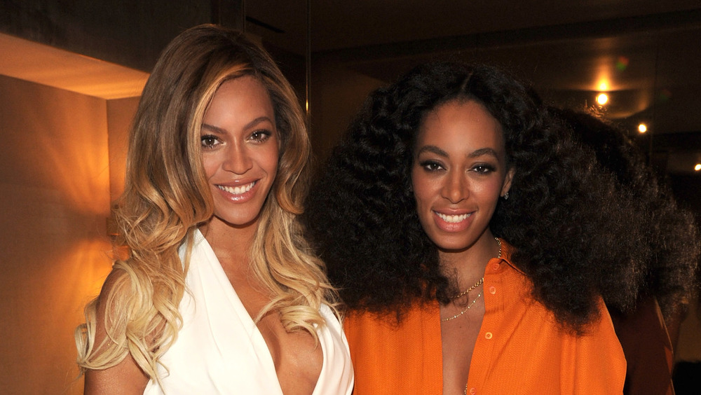 Beyonce and Solange Knowles at event