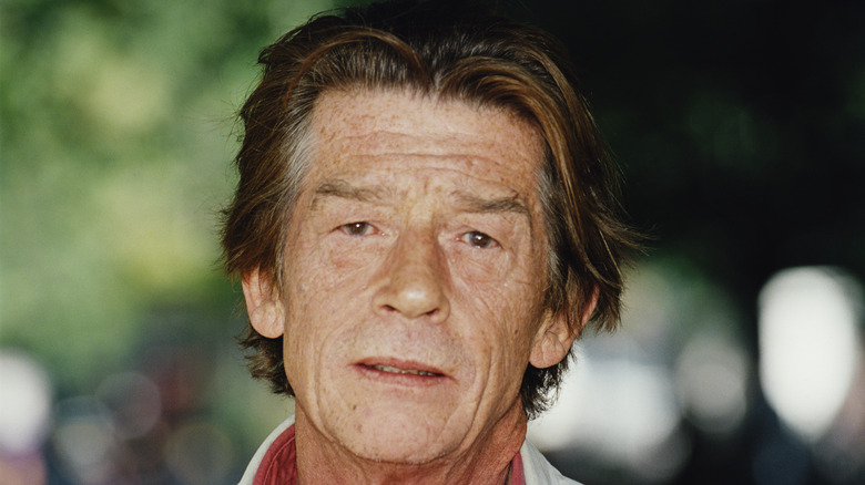 John Hurt in suit