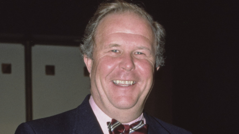 Ned Beatty wears bow tie and smiles