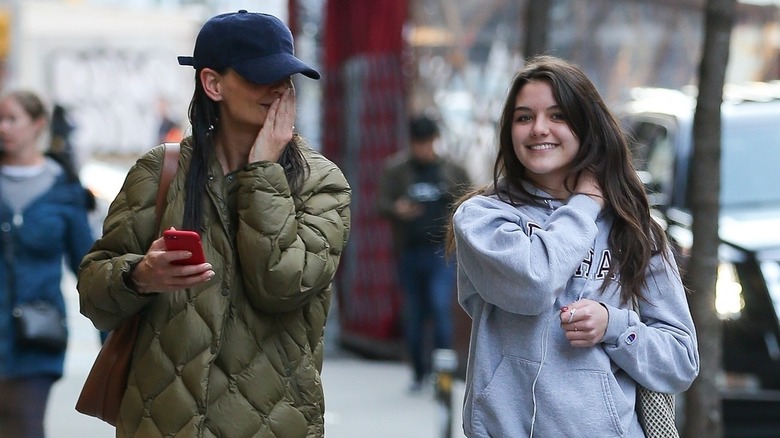 Katie Holmes and Suri Cruise walking