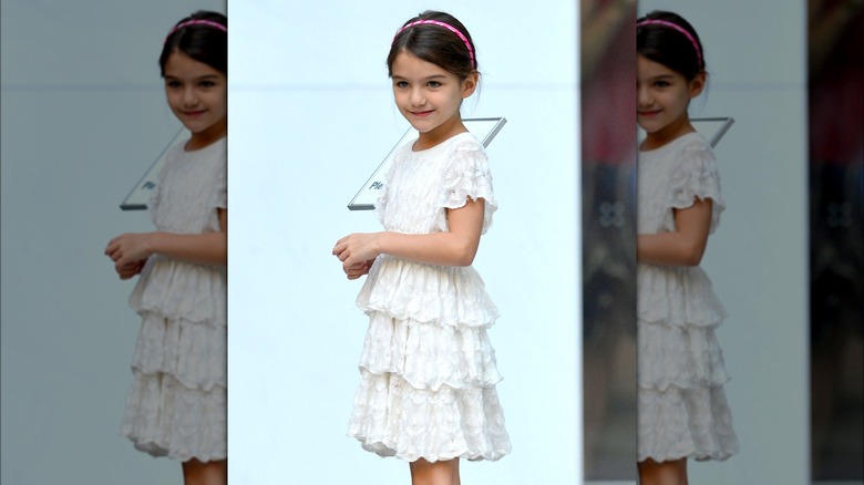 Suri Cruise posing