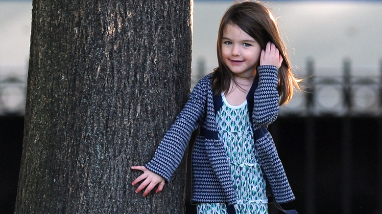 Suri Cruise posing