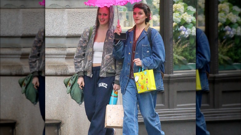 Suri Cruise walking with friend in NYC